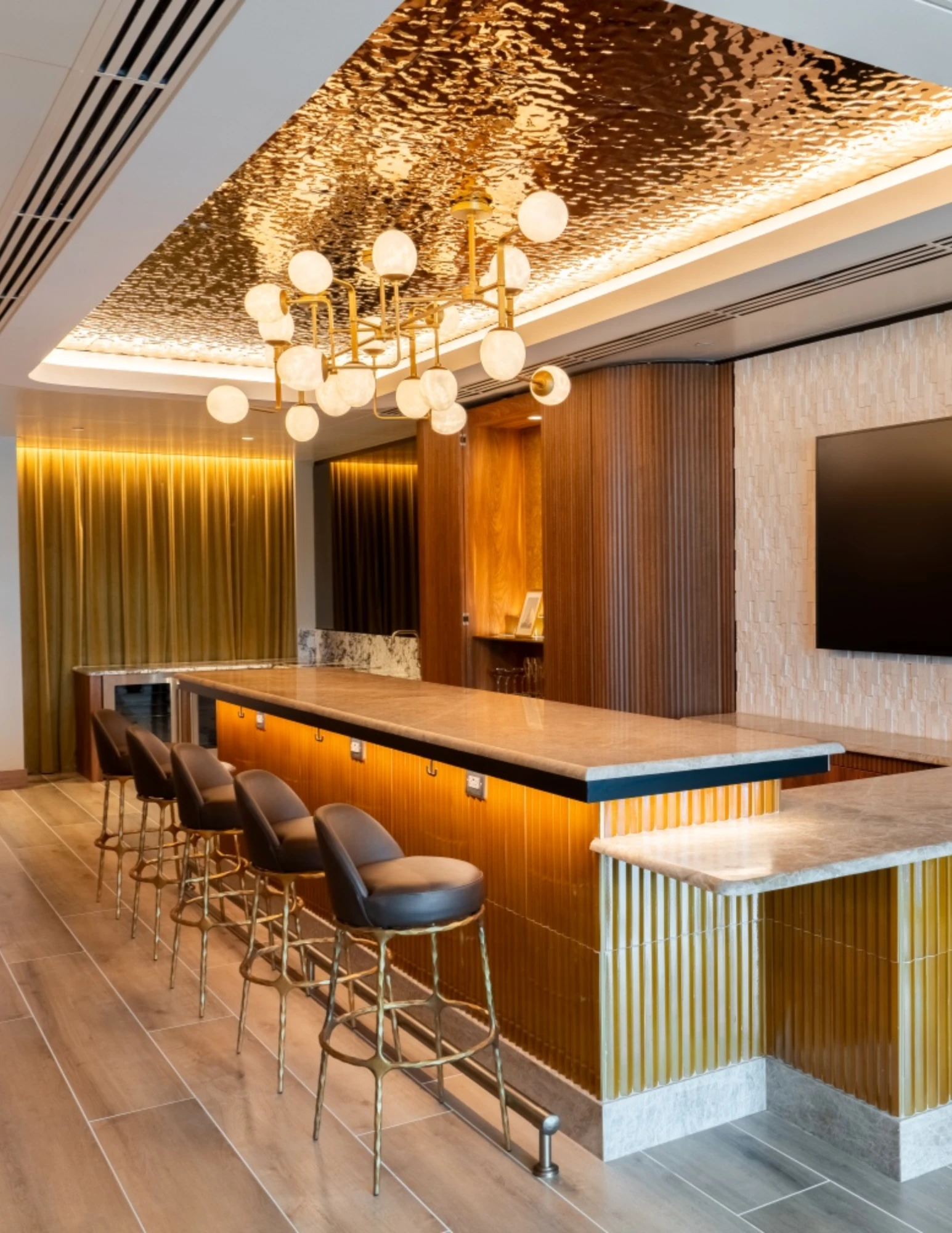 FAME Magazine coverage of Armina Stone’s Miami HEAT Kaseya Center luxury suite renovation featuring custom stone and millwork.